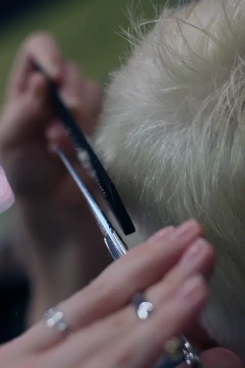 Hair stylist cutting hair salon — Salon & Beauty, Lahore