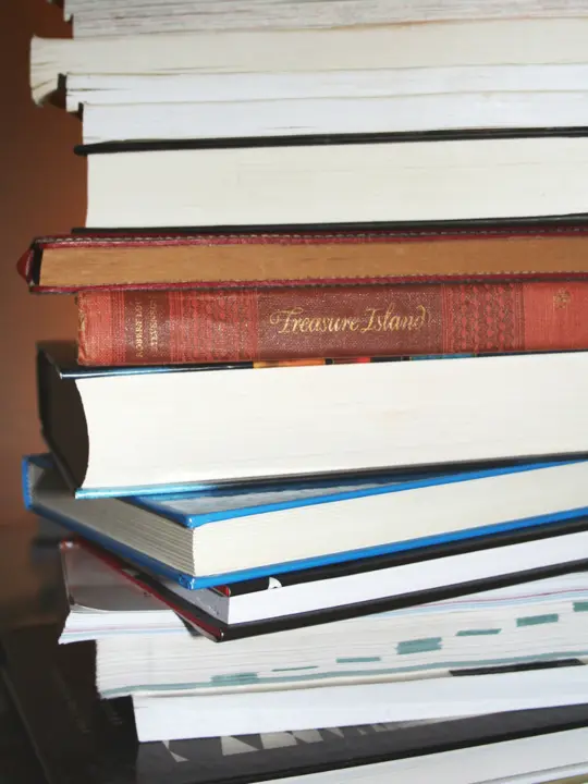 Stack of textbooks — School & Academy, Lahore