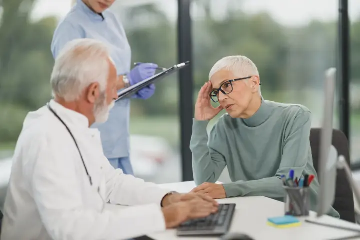 Doctor consulting patient clinic — Clinic & Dental, Lahore